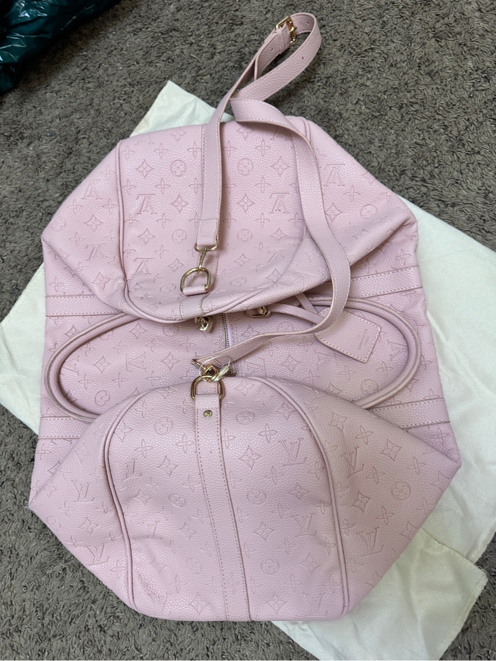 Inspired Pink embossed Monogram soft leather duffle